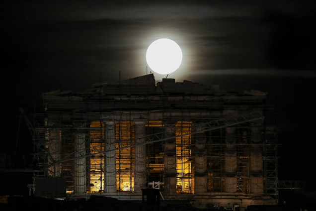 Moon rising over the Parthenon in Athens, Greece. Image: Yorgos Karahalis/AP